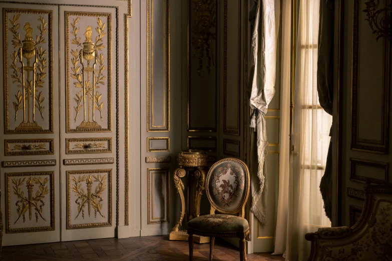 a chair sitting in a room next to a window, inspired by Adélaïde Labille-Guiard, rococo, gold decorations, massive decorated doors, shot on sony a 7 iii, smooth panelling