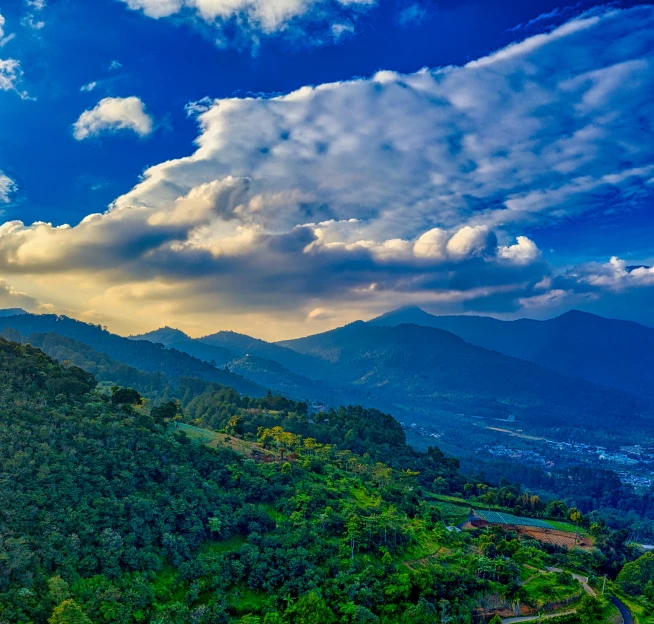 a scenic view of a valley with mountains in the background, by Alejandro Obregón, pexels contest winner, sumatraism, under blue clouds, hdr!, taiwan, nice afternoon lighting