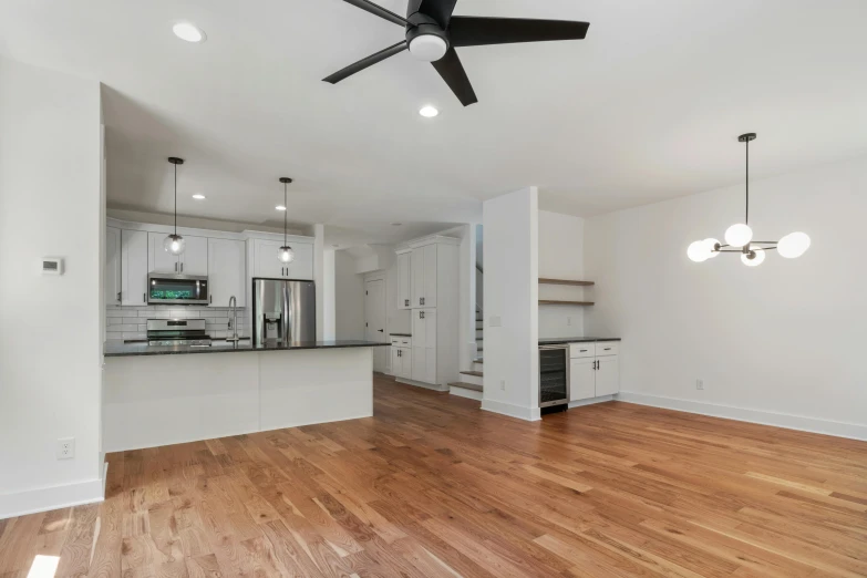 a living room with hardwood floors and a ceiling fan, by Carey Morris, unsplash contest winner, light and space, overheard camera view of kitchen, on white background, professional 8 k, multiple stories