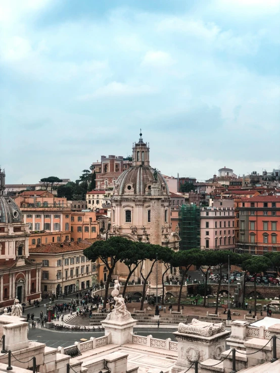 a view of a city from the top of a hill, by Robbie Trevino, pexels contest winner, neoclassicism, terracotta, in a square, profile image, high resolution photograph