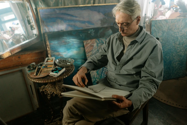 a man sitting in a chair reading a book, a photorealistic painting, pexels contest winner, visual art, dark grey haired man, still from a live action movie, weta studio and james jean, haeckel and alasdair gray