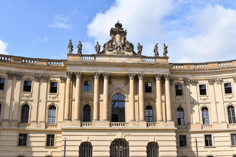 a large building with a statue on top of it, by Tom Wänerstrand, neoclassicism, huge towering magical university, preserved historical, 🚿🗝📝