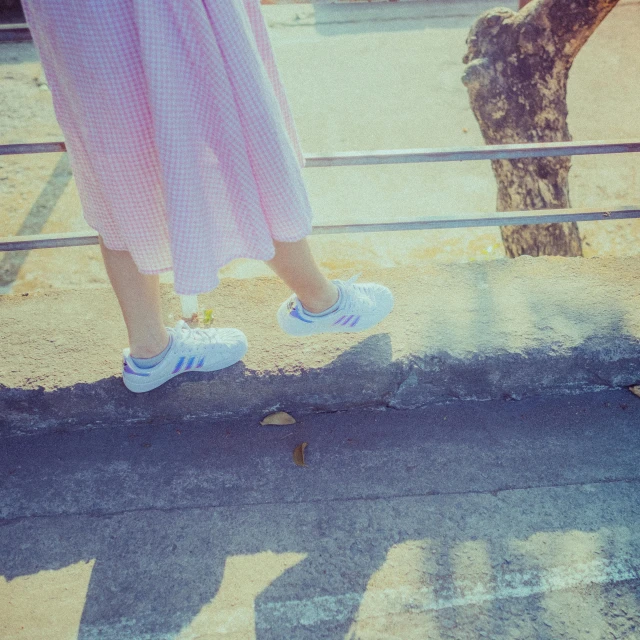 a couple of people that are standing in front of a fence, a picture, pink shoes, light leaks, 15081959 21121991 01012000 4k, ulzzang