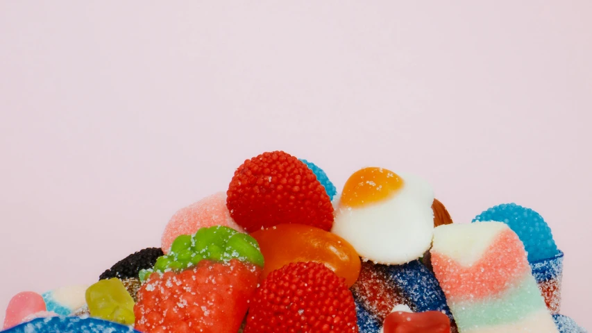 a pile of assorted candy sitting on top of a table, a still life, by Doug Ohlson, unsplash, jelly - like texture, profile image, 🎀 🧟 🍓 🧚, detailed product image