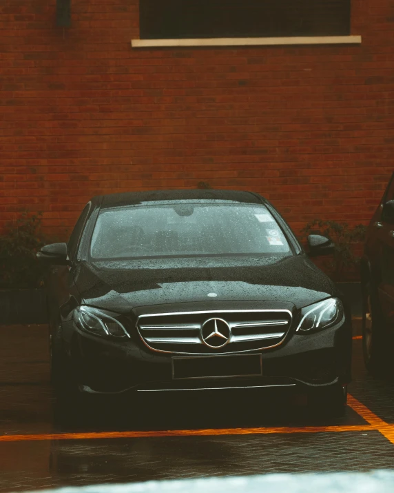 a couple of cars parked next to each other in a parking lot, pexels contest winner, mercedez benz, lgbtq, thumbnail, wrapped in black