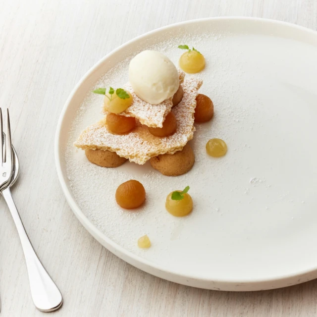 a close up of a plate of food on a table, inspired by Barthélemy Menn, apple pie, sleek white, australia, epicurious