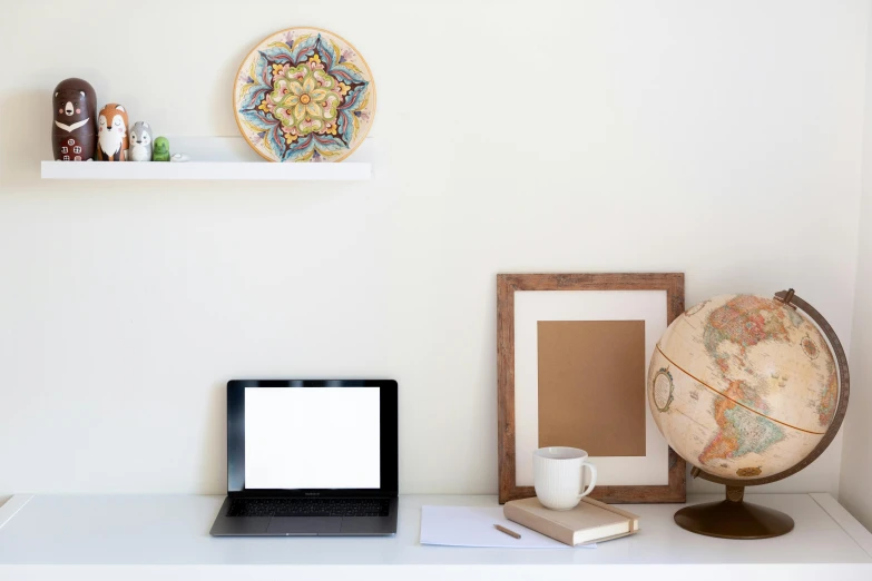 a laptop computer sitting on top of a white desk, inspired by Jan Müller, round mirror on the wall, jpeg artefacts on canvas, white background wall, a wooden