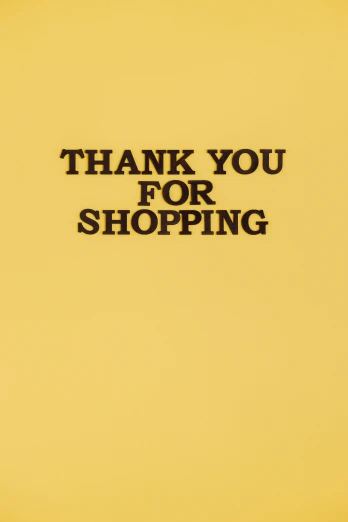a sign that says thank you for shopping, an album cover, by Paul Bird, yellow, f / 1, detail shot, ( ( theatrical ) )