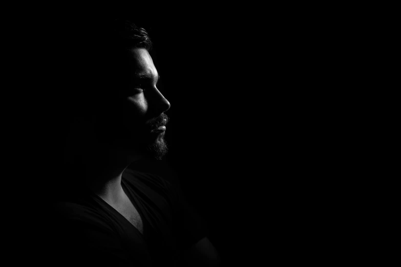 a black and white photo of a man in the dark, a black and white photo, unsplash, minimalism, cgsociety portrait, backlit portrait, darksynth character portrait, profile picture 1024px