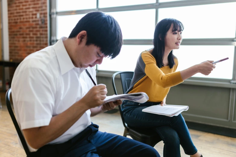 a couple of people that are sitting down, a picture, by Jang Seung-eop, teaching, background image, concentration, gemma chen