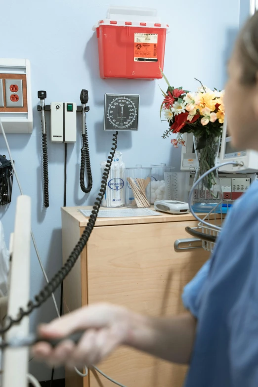 a nurse talking to a patient in a hospital room, by Jason Felix, private press, closeup photograph, colorful medical equipment, phone photo, flowers