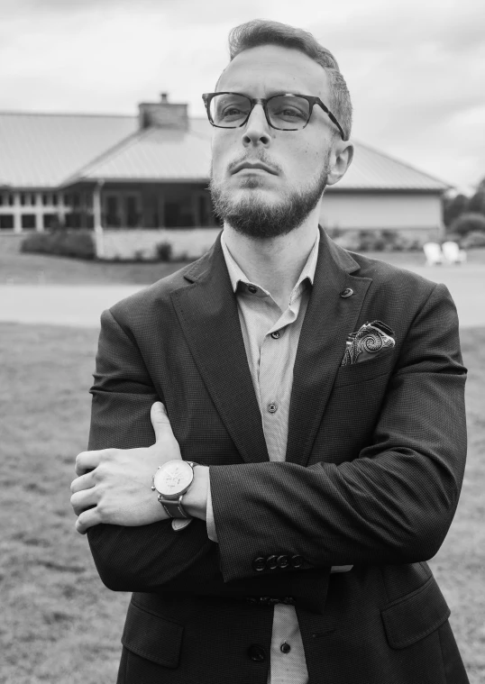 a black and white photo of a man in a suit, by Andrew Stevovich, avatar image, outdoor photo, max bedulenko, sam hyde