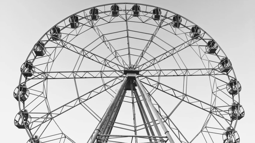 a black and white photo of a ferris wheel, high details photo, mesh structure, trending photo, round-cropped