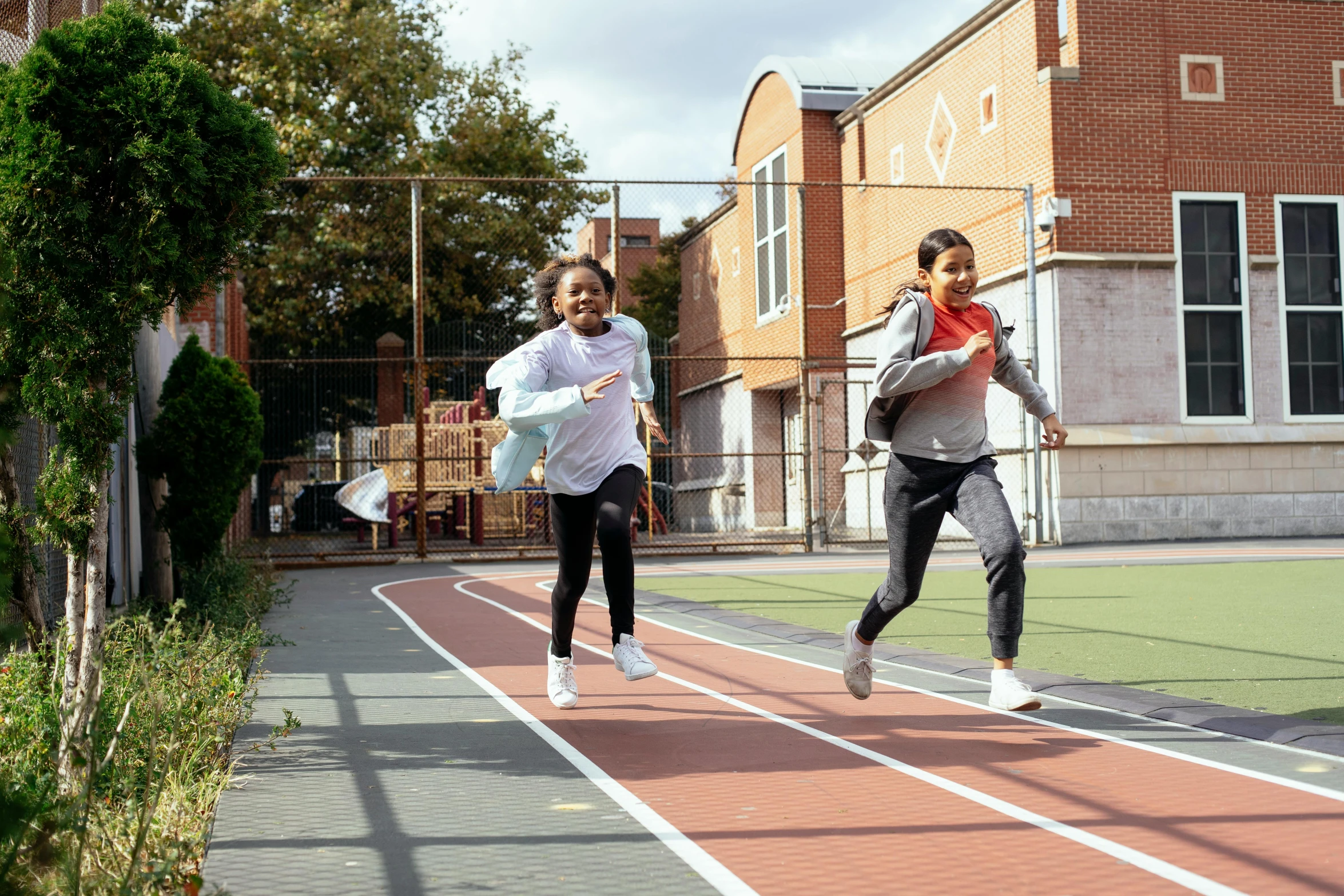 a couple of people that are on a tennis court, ashcan school, girl running, chappie in an adidas track suit, 15081959 21121991 01012000 4k, aida muluneh