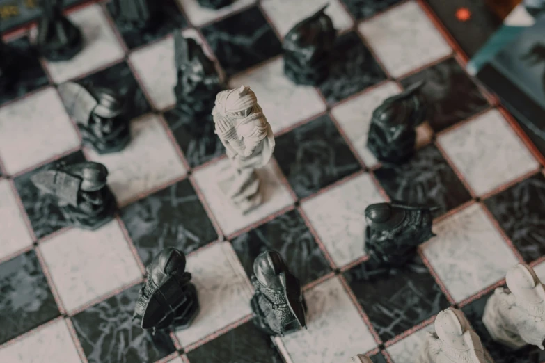 a close up of a chess board with chess pieces on it, a marble sculpture, unsplash contest winner, renaissance, 🦩🪐🐞👩🏻🦳, knight of cups, attacking, ash thorp