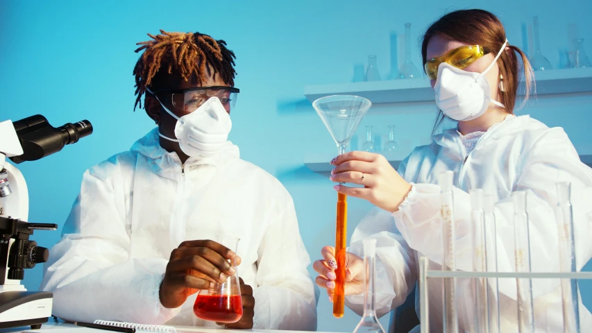 a couple of people that are in a lab, trending on pexels, sterile colours, thumbnail, afro tech, fluids