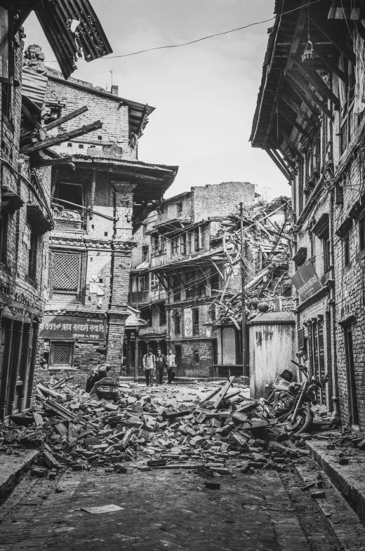 a black and white photo of an old street, auto-destructive art, nepali architecture buildings, buildings collapsed, in 2 0 1 5, f/9