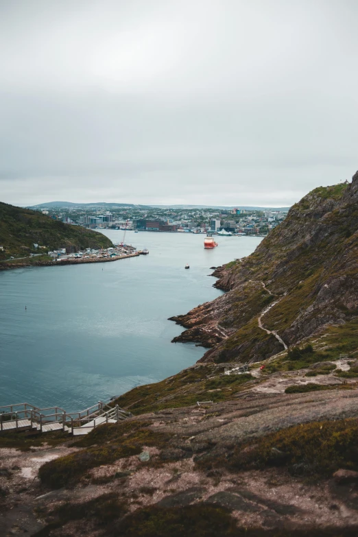 a view of a body of water from a hill, a photo, pexels contest winner, les nabis, ships in the harbor, hziulquoigmnzhah, hiking trail, 1 8 mm wide shot