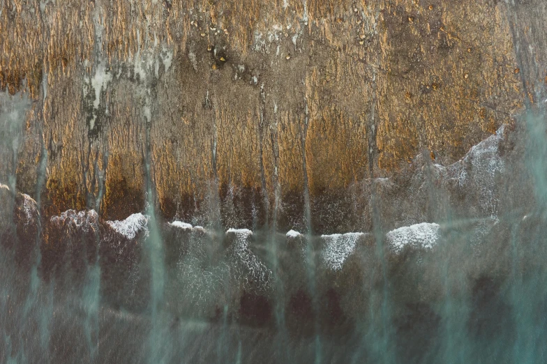 a man riding a surfboard on top of a wave, an ultrafine detailed painting, inspired by Andreas Gursky, unsplash, lyrical abstraction, rusted metal texture, street of teal stone, iceland landscape photography, detail texture