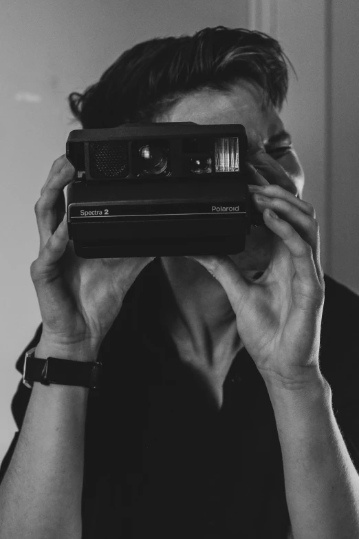 a man holding a camera up to his face, a black and white photo, pexels contest winner, visual art, 8 0 ies aesthetic, gamer aesthetic, i see you, polaroid of a dream