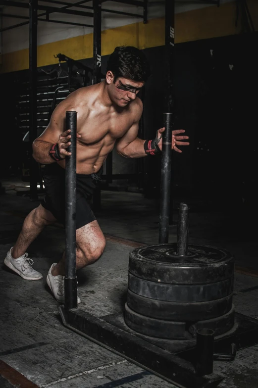 a man lifting a barbell in a gym, a portrait, by Adam Marczyński, pexels contest winner, crawling, promo image, multi-part, instagram picture