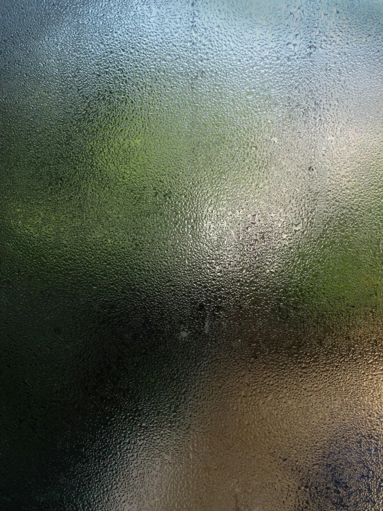 a close up of a frosted window with trees in the background, inspired by Jan Rustem, gradient from green to black, sweaty face, texture for 3d, ilustration