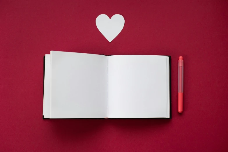 an open book with a heart cut out of it, an album cover, pexels contest winner, pen and paper, red wall, 15081959 21121991 01012000 4k, whiteboards