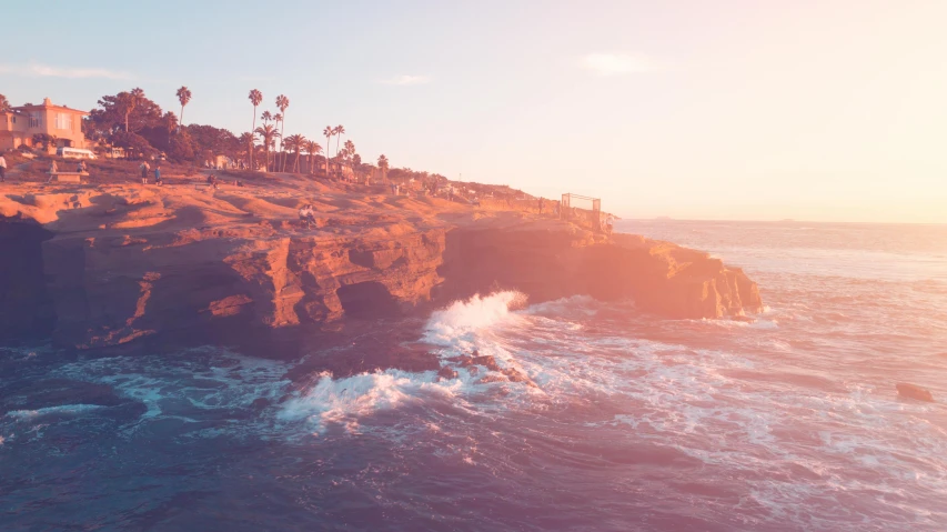 a large body of water next to a cliff, pexels contest winner, romanticism, sunfaded, martin sandiego, 3d parallax view effect, rough waves