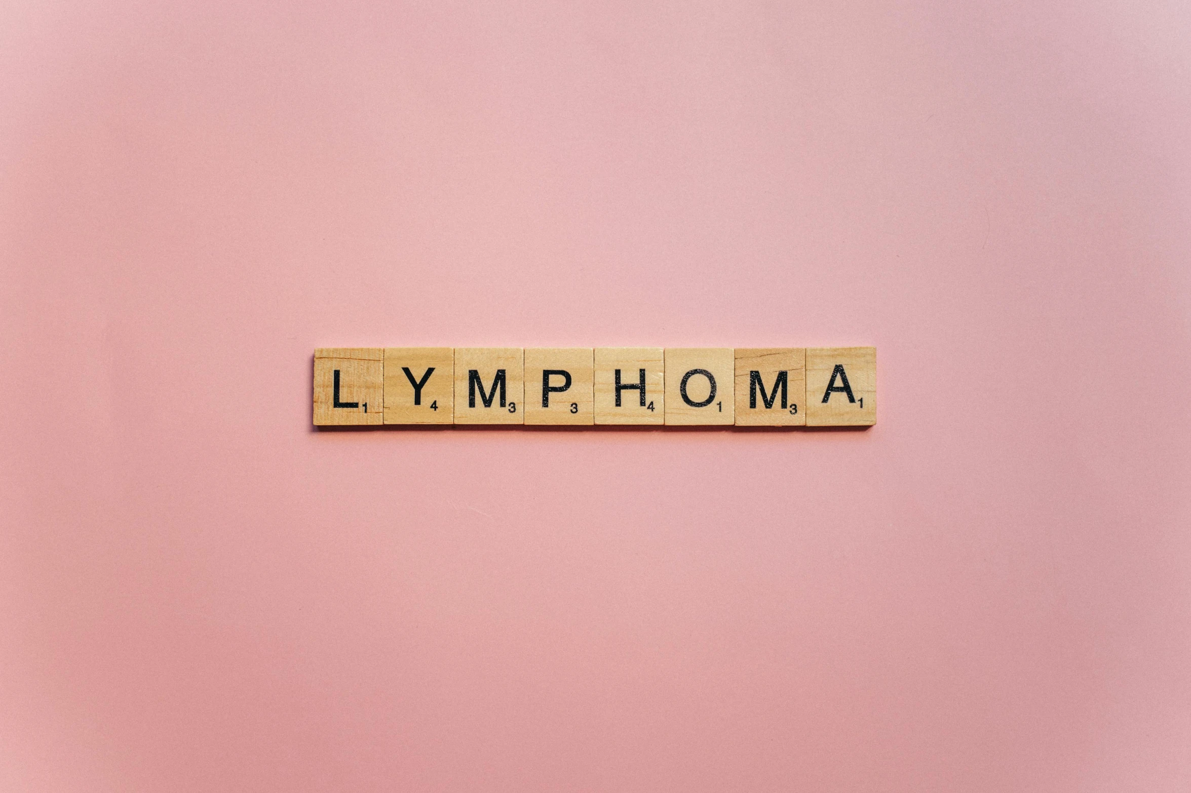 a scrabble spelling lymphma on a pink background, trending on unsplash, synchromism, medical labels, thumbnail, limbo, come