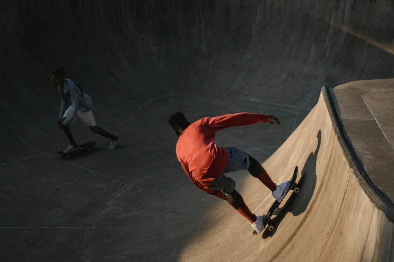 a man riding a skateboard up the side of a ramp, unsplash contest winner, hyperrealism, medium shot of two characters, curved body, sport, kano)