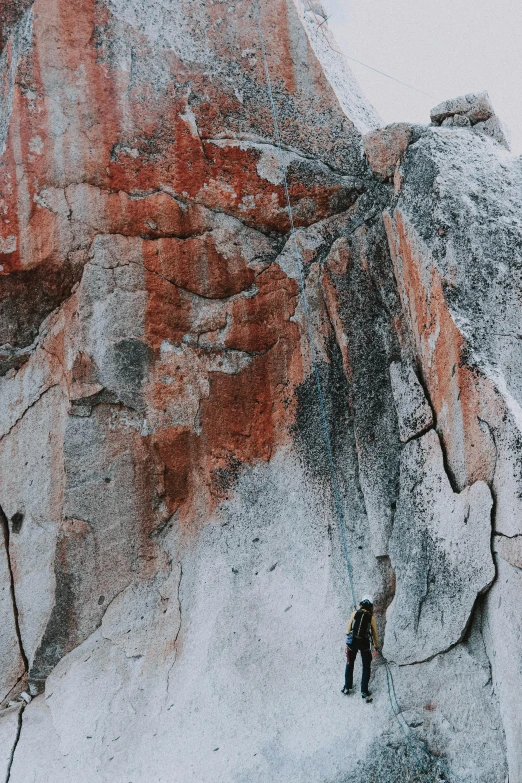 a group of people climbing up the side of a mountain, an ultrafine detailed painting, unsplash contest winner, red and white marble panels, high colored texture, trending photo, soft cracks