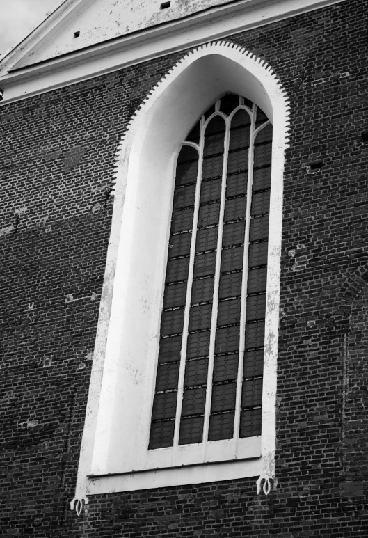 a black and white photo of a church, a black and white photo, inspired by Abraham van den Tempel, postminimalism, brick, 2 0 0 4 photograph, window ( city ), square lines