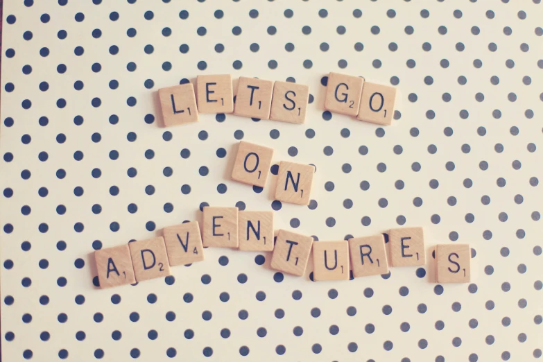 a scrabble board that says let's go on adventures, instagram, polkadots, background image, retro style ”, wallpaper”