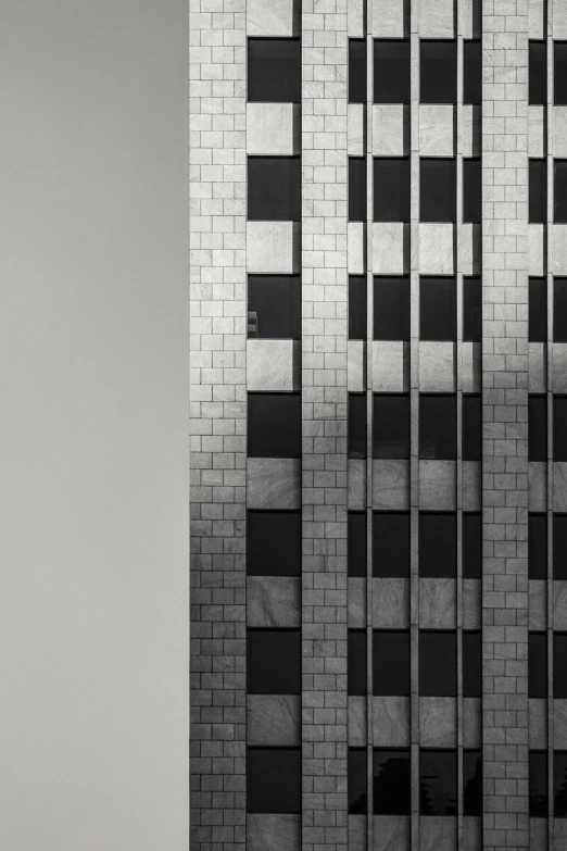 a black and white photo of a tall building, a black and white photo, inspired by David Chipperfield, unsplash, detiled, full of glass. cgsociety, buildings photorealism, flat minimalistic