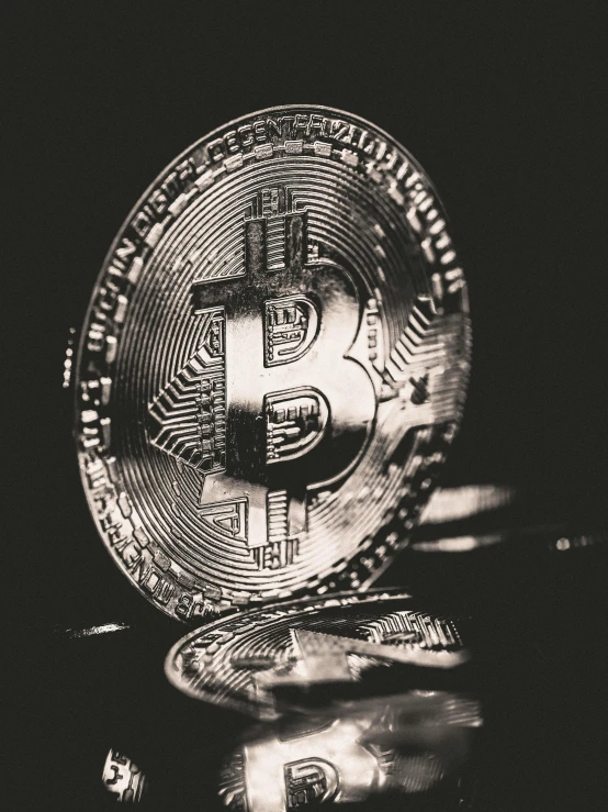 a bitcoin sitting on top of a pile of coins, unsplash, grainy black and white footage, promo image, instagram photo, studio photo