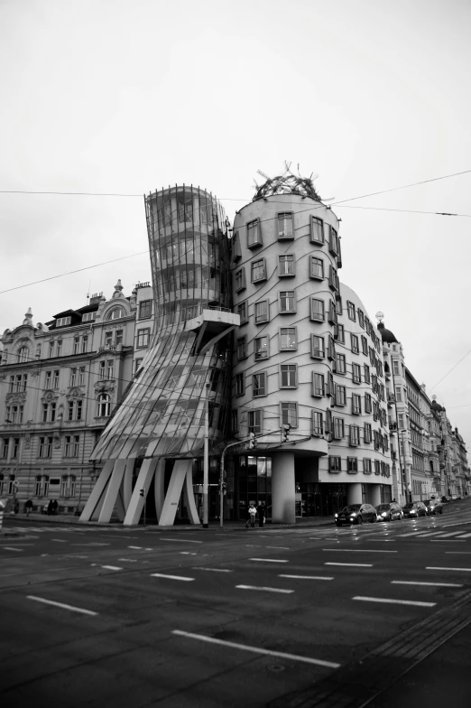 a black and white photo of a building, inspired by Vladimir Tatlin, prague, collapsed buildings, wim wenders, square