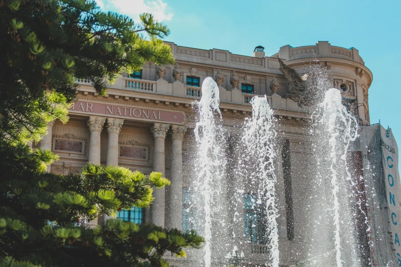 a large building with a fountain in front of it, pexels contest winner, neoclassicism, avatar image, las vegas, water cascading, high resolution image