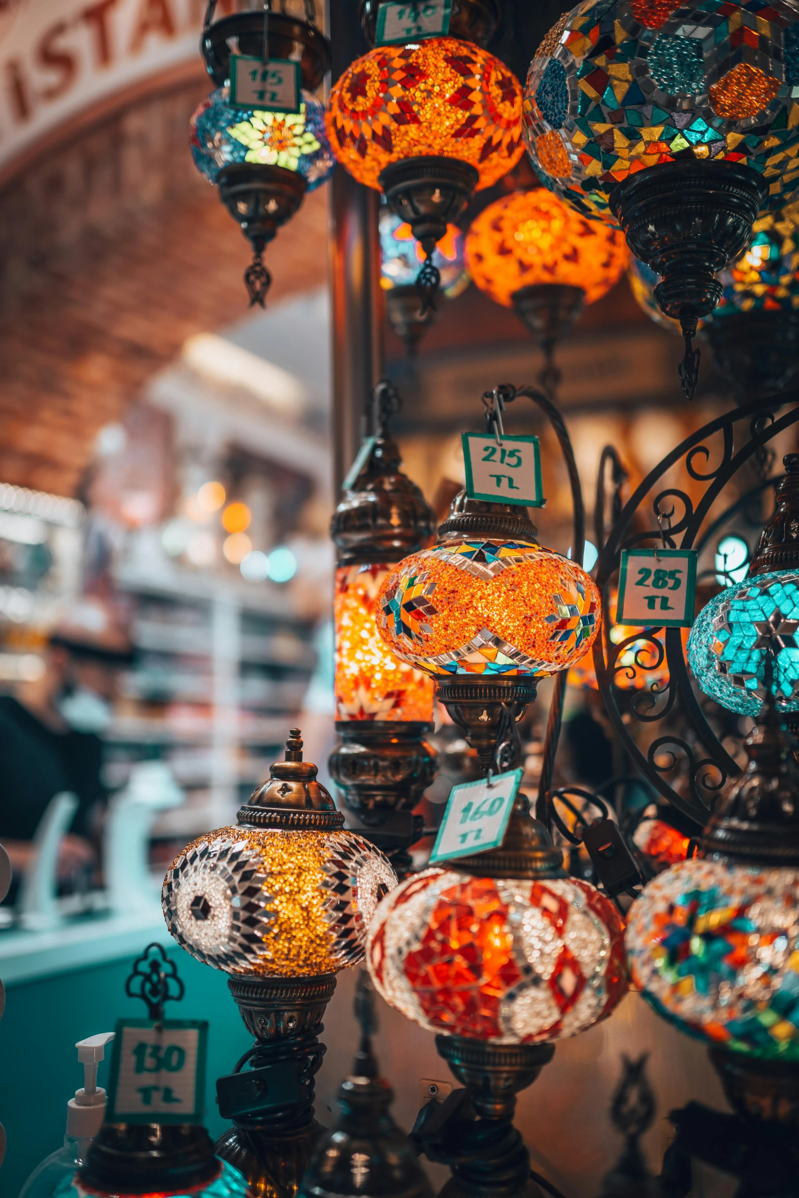 a market filled with lots of colorful lamps, trending on pexels, turquoise and venetian red, profile pic, ornate details, sparkly