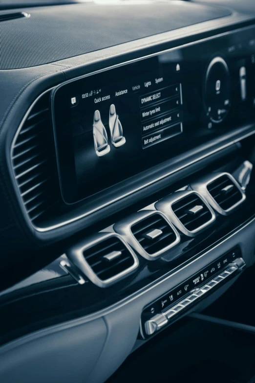 a black and white photo of a car dashboard, glowing blue interior components, mercedez benz, thumbnail, profile image