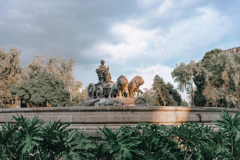 a statue of a man on a horse in a park, by Alejandro Obregón, unsplash contest winner, 3 nymphs circling a fountain, spanish, city view, square