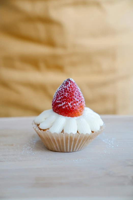 a close up of a cupcake with a strawberry on top, mini, lightweight, gleaming white, frontal shot