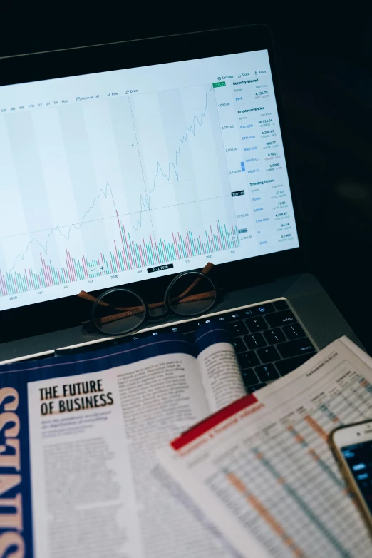 a laptop computer sitting on top of a desk, trending on unsplash, analytical art, trading stocks, thumbnail, scientific paper, economist