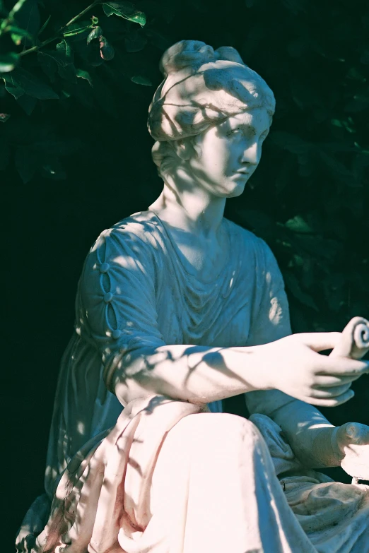 a statue of a woman holding a cell phone, a statue, inspired by Gustave Boulanger, unsplash, low quality photo, play of light, staring, artemis