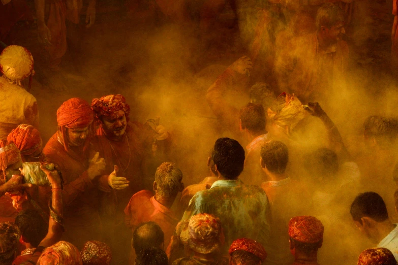 a crowd of people covered in colored powder, inspired by Steve McCurry, pexels contest winner, orange yellow ethereal, thumbnail, colour print, dusty atmosphere
