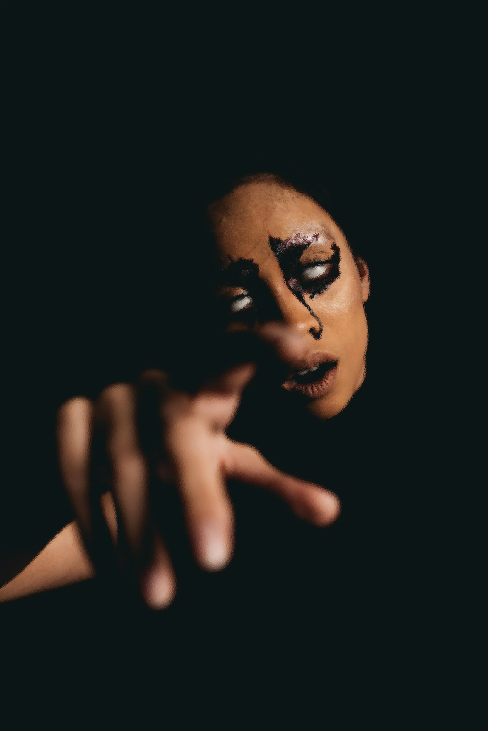 a close up of a person with a face painted, an album cover, inspired by Taro Yamamoto, unsplash, antipodeans, hands reaching for her, portrait of vanessa morgan, scary angry pose, dark ballerina