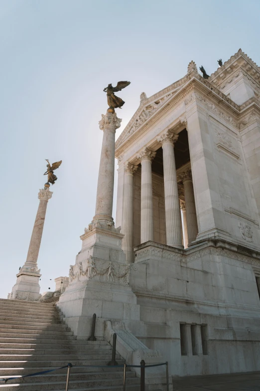 a very tall building with some statues on top of it, a statue, by Carlo Martini, pexels contest winner, neoclassicism, made of marble, temple, paolo veronese style, square