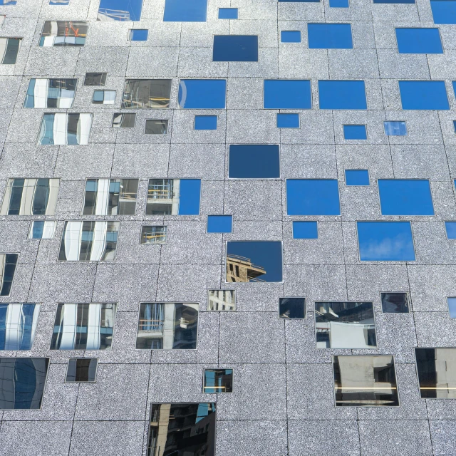 a close up of a building with many windows, inspired by Karel Dujardin, unsplash, modernism, square shapes, mirror shades, reykjavik junior college, bjarke ingels