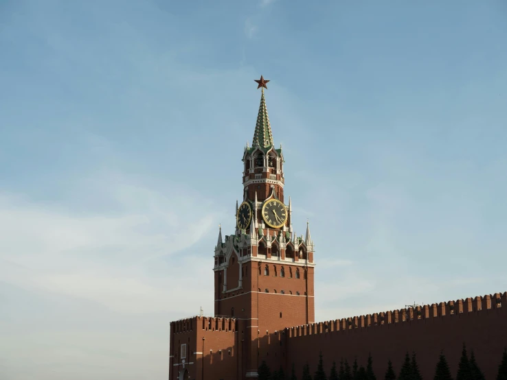 a tall tower with a clock on top of it, inspired by Vasily Surikov, pexels contest winner, socialist realism, square, brown, 000 — википедия, turrets