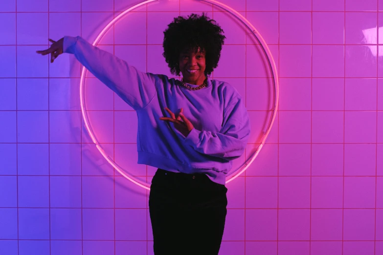 a woman standing in front of a neon circle, pexels contest winner, funk art, wearing a purple sweatsuit, satisfied pose, afro tech, mood light