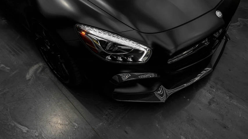 a black sports car parked in a garage, a 3D render, pexels contest winner, auto-destructive art, custom headlights, full body close-up shot, mercedes, instagram post